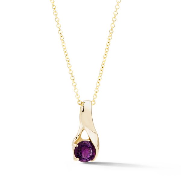 Round amethyst pendant in sculptural 14k yellow gold setting