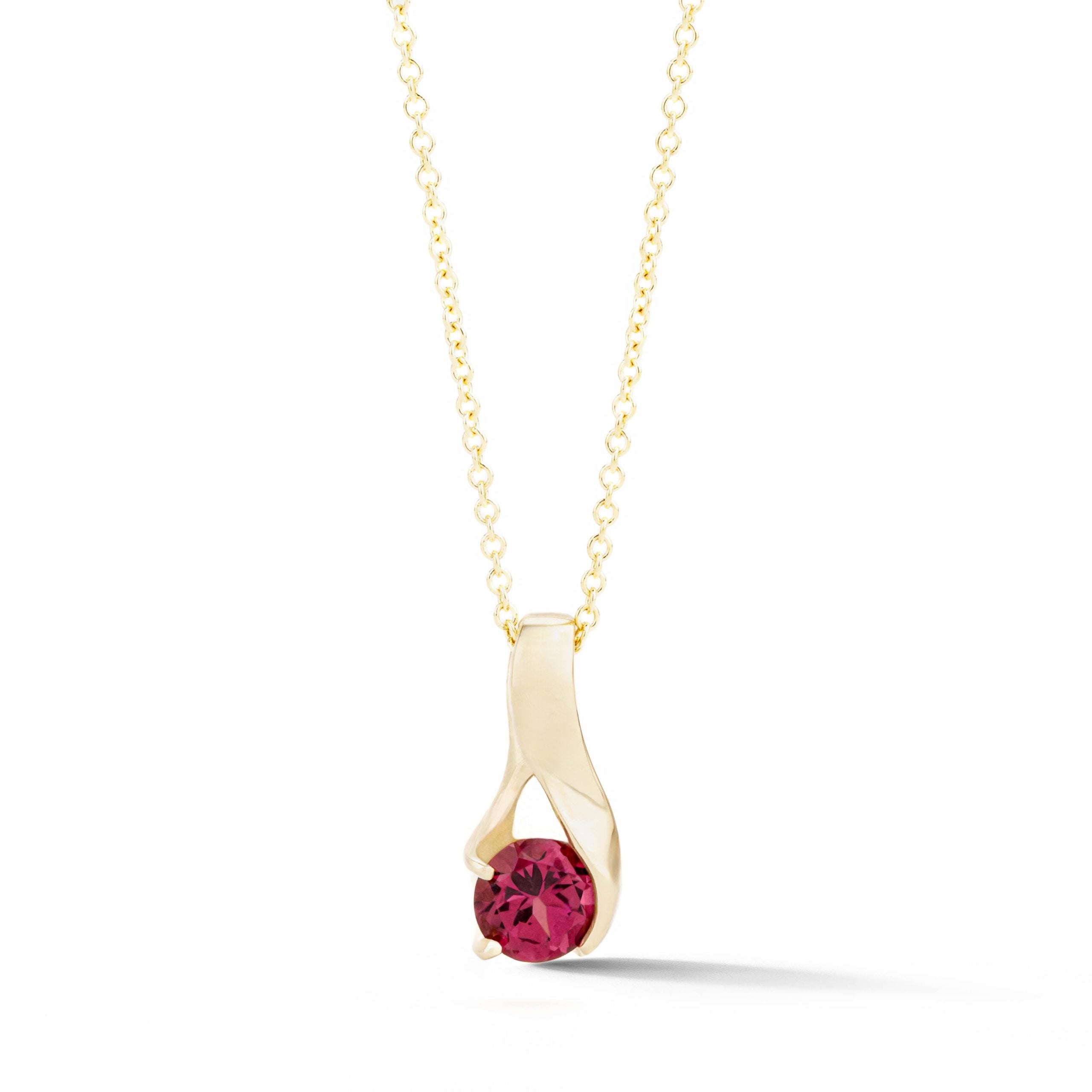 Rhodolite garnet pendant in sculptural 14k yellow gold half-wrap setting