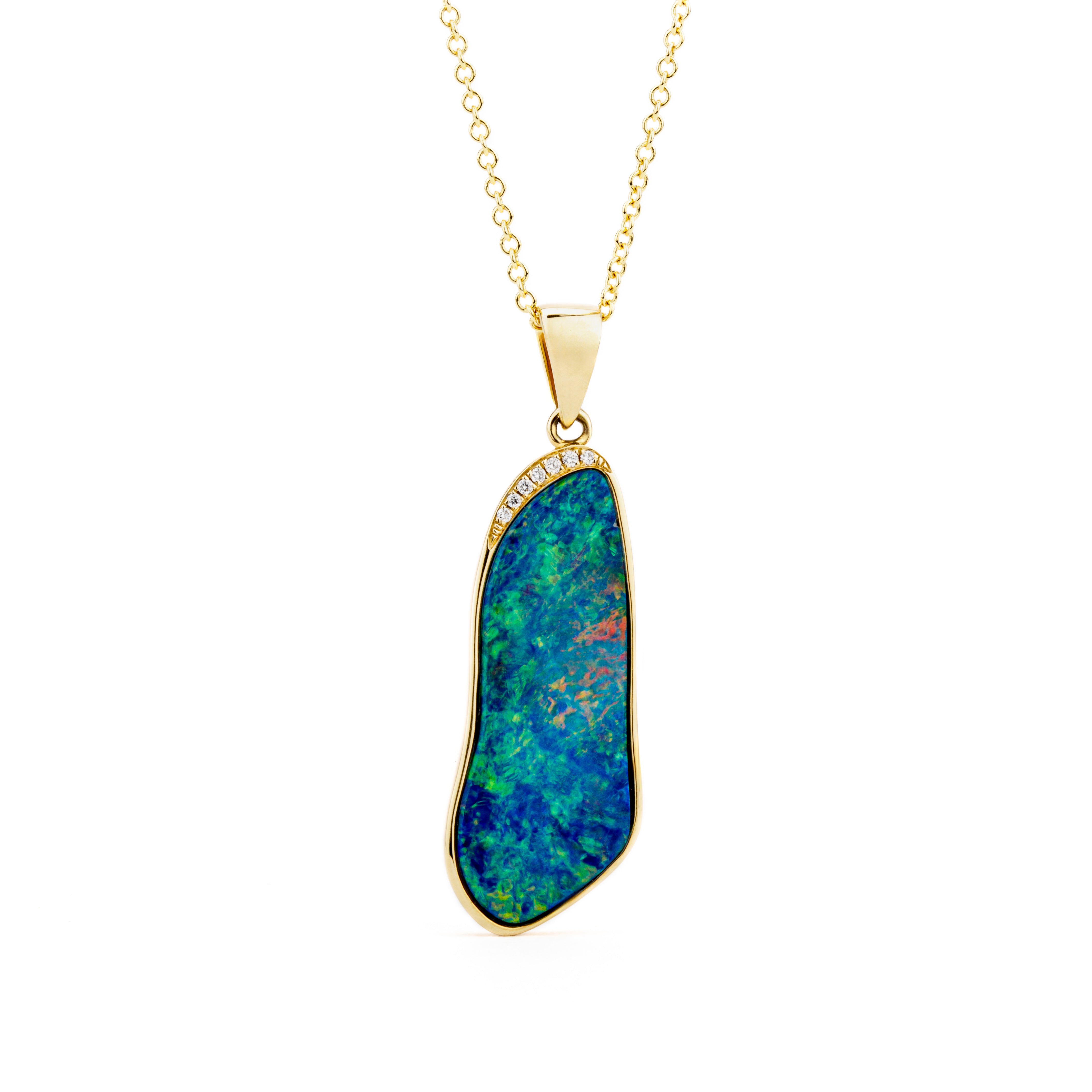 14k yellow gold pendant necklace featuring a large freeform opal doublet with pavé diamond accent