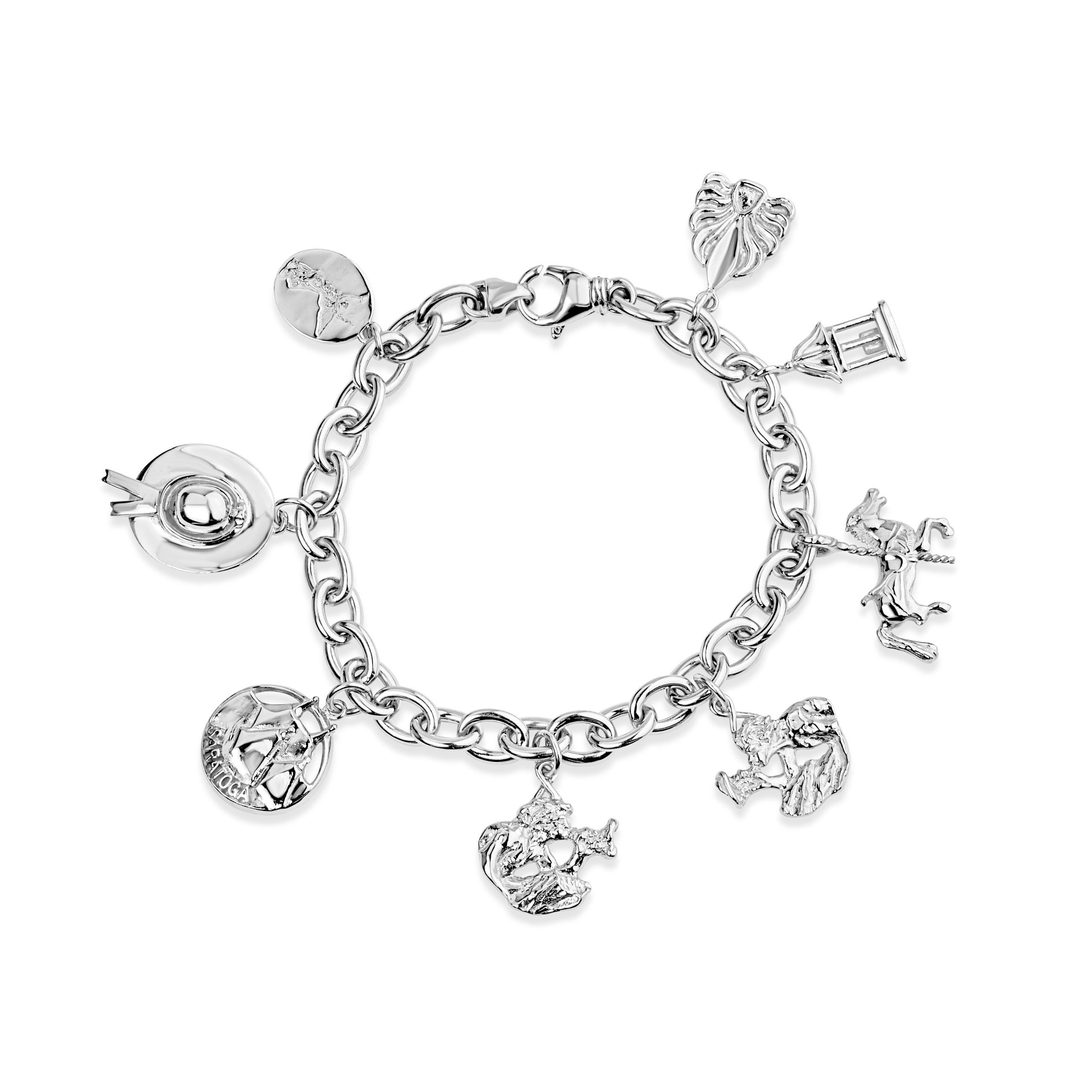 Sterling silver charm bracelet featuring eight Saratoga Springs landmark charms including the racing hat, carousel horse, Yaddo pediment, and Spirit of Life